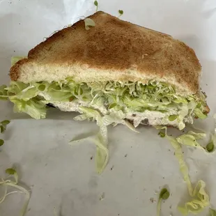 Toasted white bread, no garlic sauce, lettuce, sprouts, chix salad