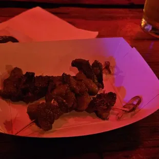 Skewers, perhaps 1.5 oz total for 12 bucks.