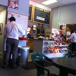 a man standing at the counter