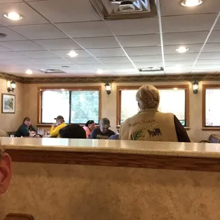 a man sitting at the counter