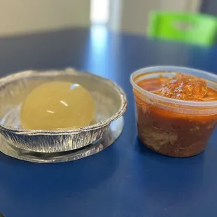 Fufu on the left, chicken tomato soup on the right. Both delicious!