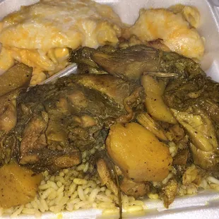 Curry Chicken, Mac &amp; cheese over red beans and rice.