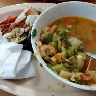 a bowl of soup and a sandwich