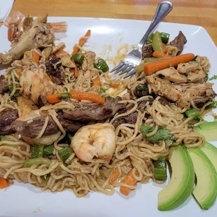 Chow mein Salvadoreño   Steak, shrimp, and Chicken. Sauce was delicious. Brought down with the cheap instant top Ramen noodles.