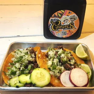 Azada (should be Asada) tacos, $4 each.