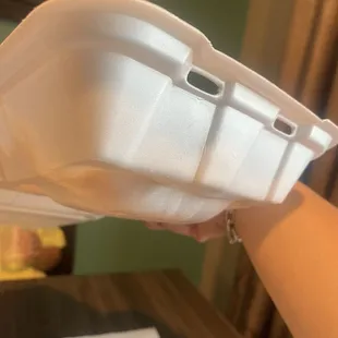 Melted styrofoam from the fries...they should use something to place underneath so the styrofoam doesn't melt off with the food