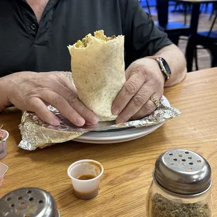 1/2 eaten California burrito