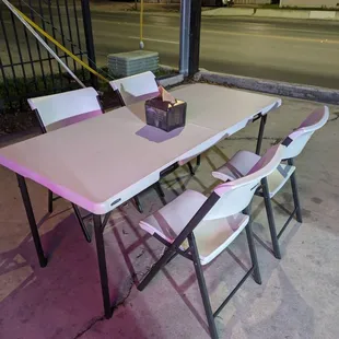 a table and chairs outside