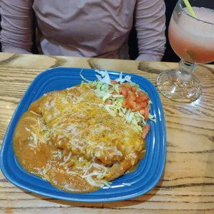 Huge stuffed sopapilla with carnitas, and raspberry coin marg