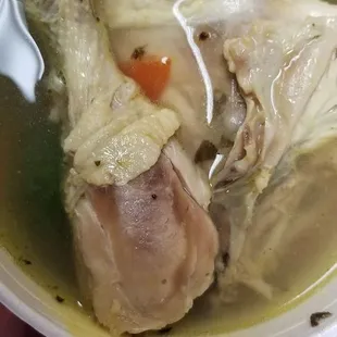 Caldo de pollo... forget those cubes of chicken it real chicken parts boooooieee. : P Not too salty!