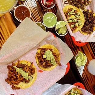 a variety of tacoss on a table