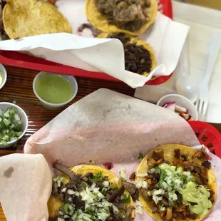 two tacos and a side of guacamole