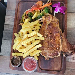 T-bone steak and fries