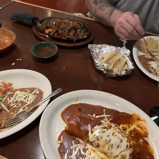 Shredded beef chimichanga enchiladas style and fajitas. Spicy margarita.
