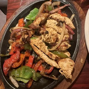 Outrageously flavorful and delicious chicken fajitas. Comes with homemade flour tortillas