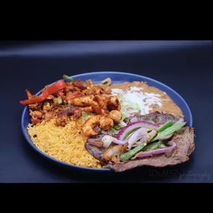 Try our Plato mixto ! "Plato VIP"  Chicken fajitas , steak , shrimp with rice and beans