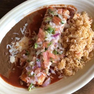Beef burrito (with added pico de gallo) with rice and beans