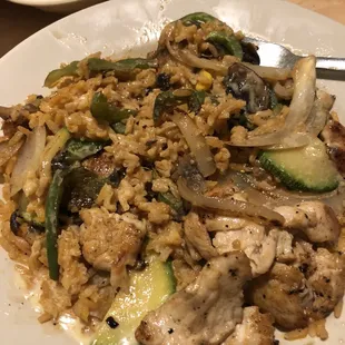 Lunch Grilled Chicken Peluza: Grilled Chicken, Peppers, Zucchini, Mushrooms, Onions, Rice, and Cheese Sauce