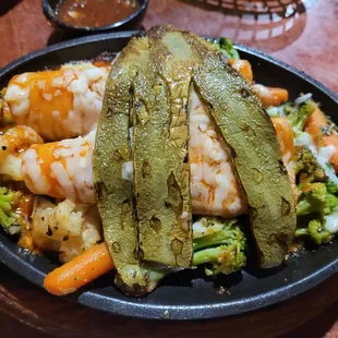 Vegetables and queso blanch enchilada with grilled nopales