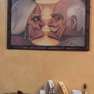 a painting of an old couple