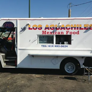 a food truck parked in a parking lot