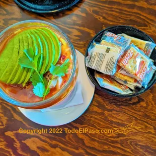 an avocado in a glass