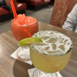 Frozen strawberry and a house marg on the rocks