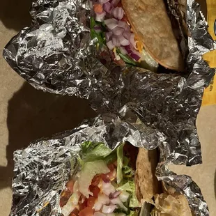 Supposed to be two tacos inside of a Styrofoam box