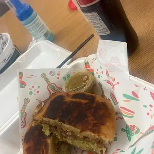 Steak Torta with a bottled coke