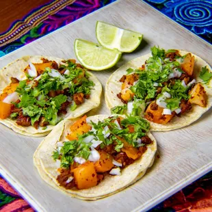 three tacos on a plate