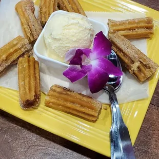 Churros con cajeta and vanilla ice cream!