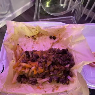 Sad carne fries with nacho cheese.