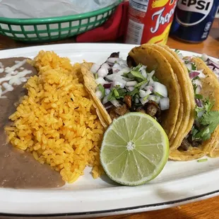Al pastor and steak taco dinner