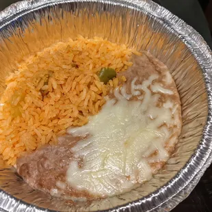 Rice and beans to accompany the meal.