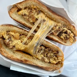 two sandwiches with cheese