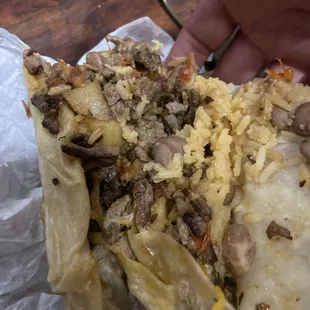 How a Cali b don't got no sour cream n got no French fries but got beans and rice