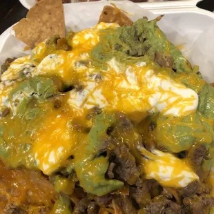 Chips supreme aka carne asada nachos $11.99