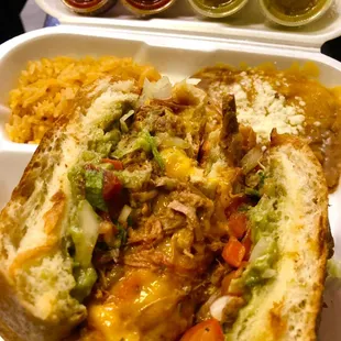 Shredded beef torta. Make it a combo with rice, beans, and a soda pop.