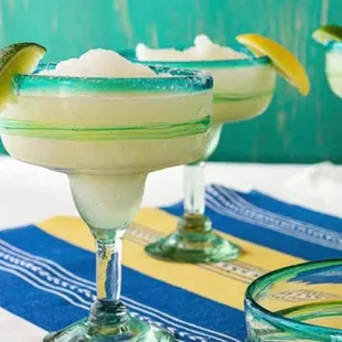two margaritas with lime slices