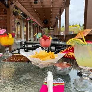 a table with drinks and snacks