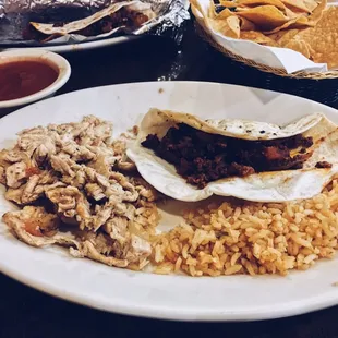Chorizo taco with chicken and Spanish rice