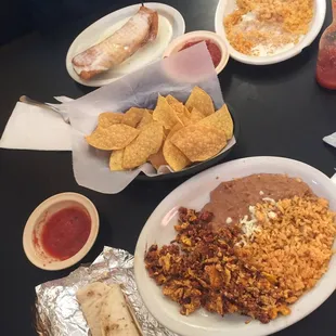 Huevos con chorizo and chimichanga ala carte!! Delicious!!