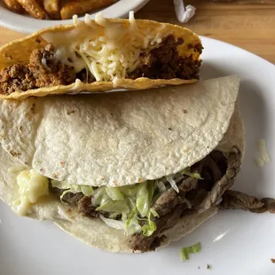 One steak soft taco, one hard beef taco
