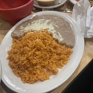 Side of rice and refried beans