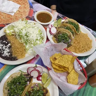 Pastor tacos, birria tacos, carne asada tacos, and empanadas.