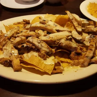 First time having the fajita chicken nachos. Massive plate of meat.