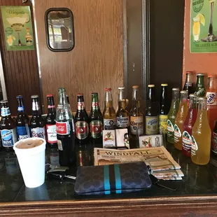 a table full of beer bottles