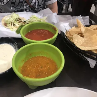 Chips, Hot Salsa, Cheese Dip, House Salsa and Asada tacos with lettuce