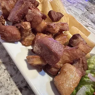 Yuca Frita with pork belly delicious