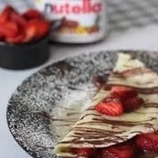 Strawberry Nutella crepe with Extra strawberries so bomb!